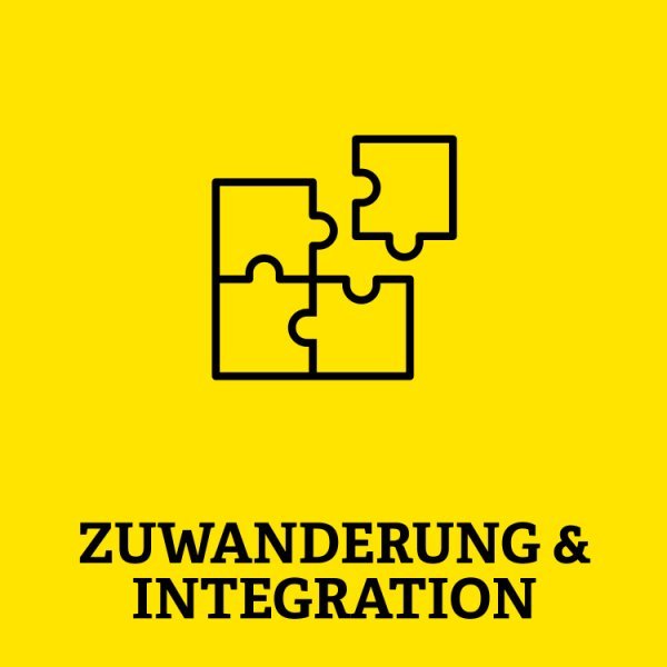 Puzzel mit Aufschrift Zuwanderung und Integration