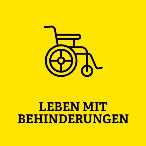 Rollstuhl mit Aufschrift Leben mit Behinderung